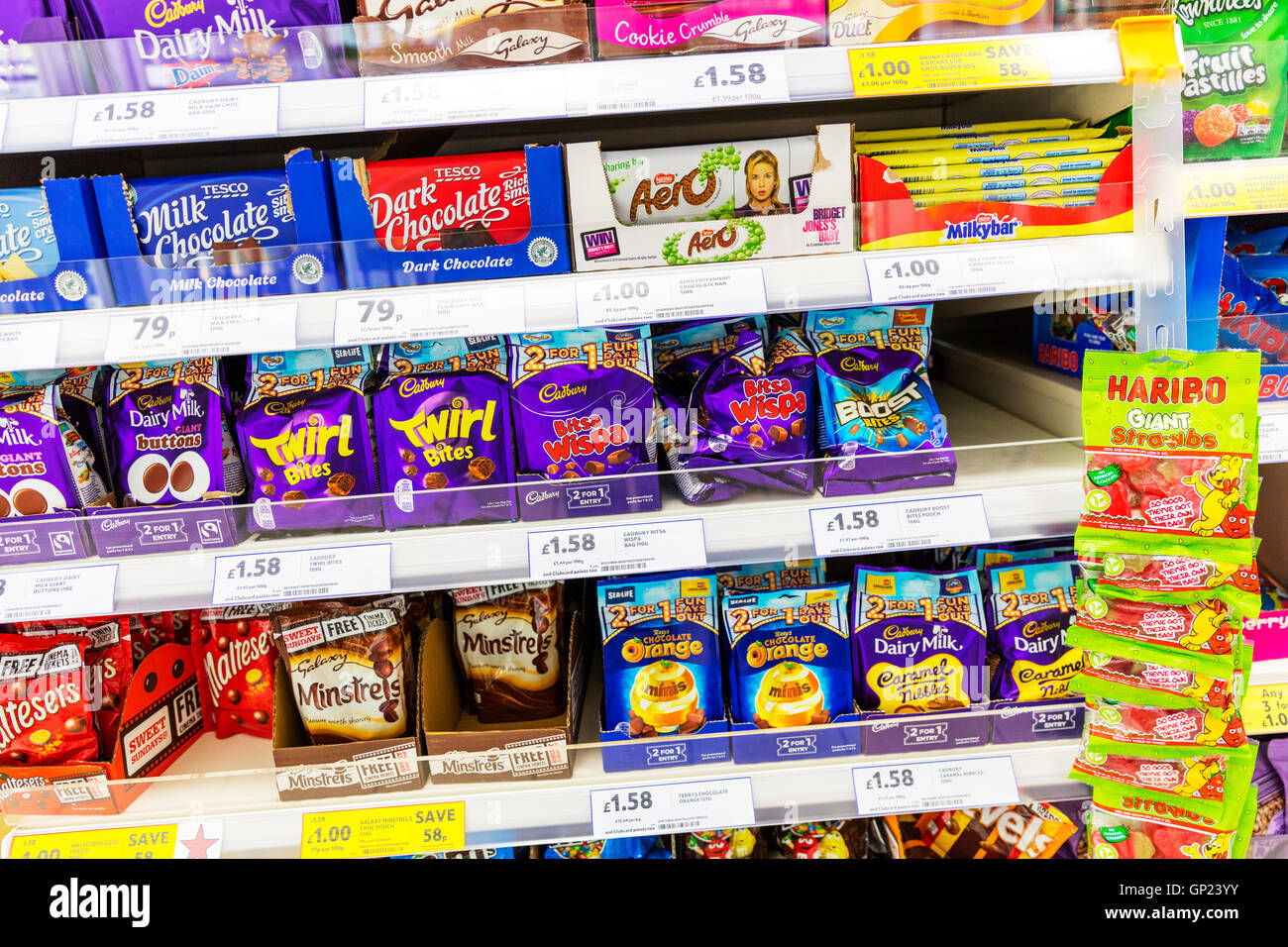 Chocolate bars products Cadbury galaxy twirl supermarket display stand supermarkets displays UK England GB Stock Photo