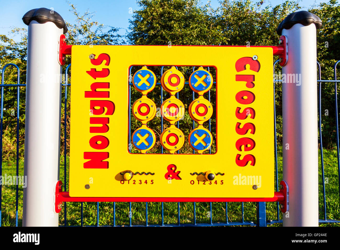 Noughts & Crosses game children's games kids game play park board fun for kids UK England GB Stock Photo