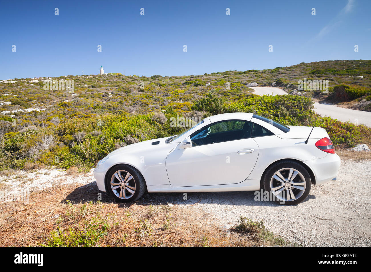 Zakynthos, Greece - August 20, 2016: White Mercedes-Benz SLK 200 pre-facelift car stands on the roadside in summer Stock Photo