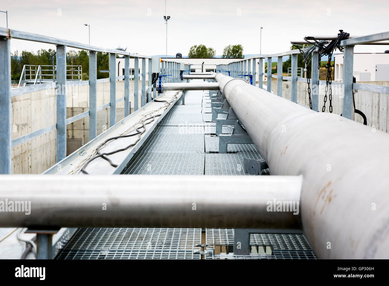 Wastewater treatment plant pipes. Water pumping station. Wastewater treatment is a process used to convert dirty wastewater into Stock Photo