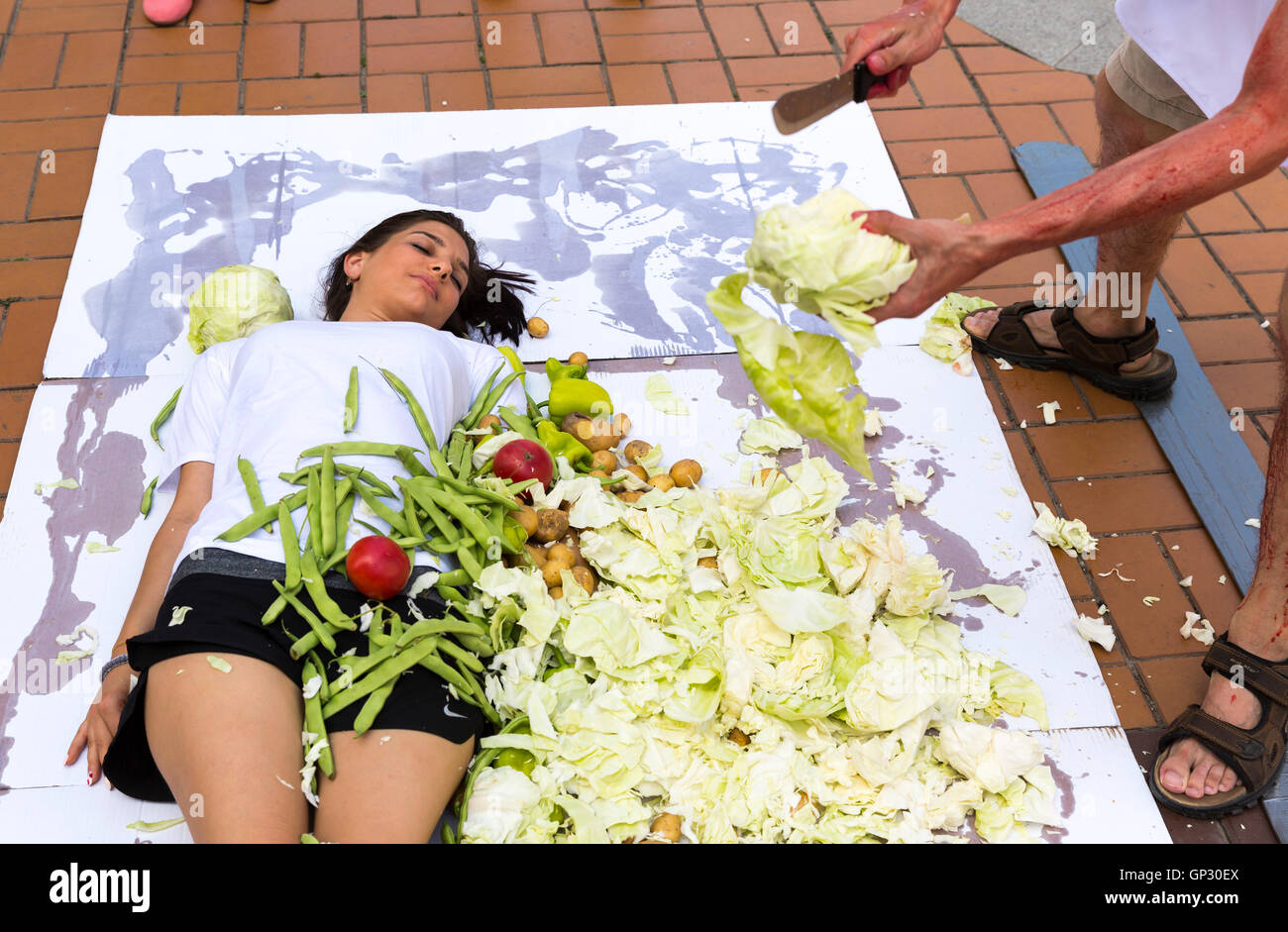 Sofia, Bulgaria - June 21, 2016: Vegans and vegetarians animal rights activists are cooking humans during a protes against killi Stock Photo