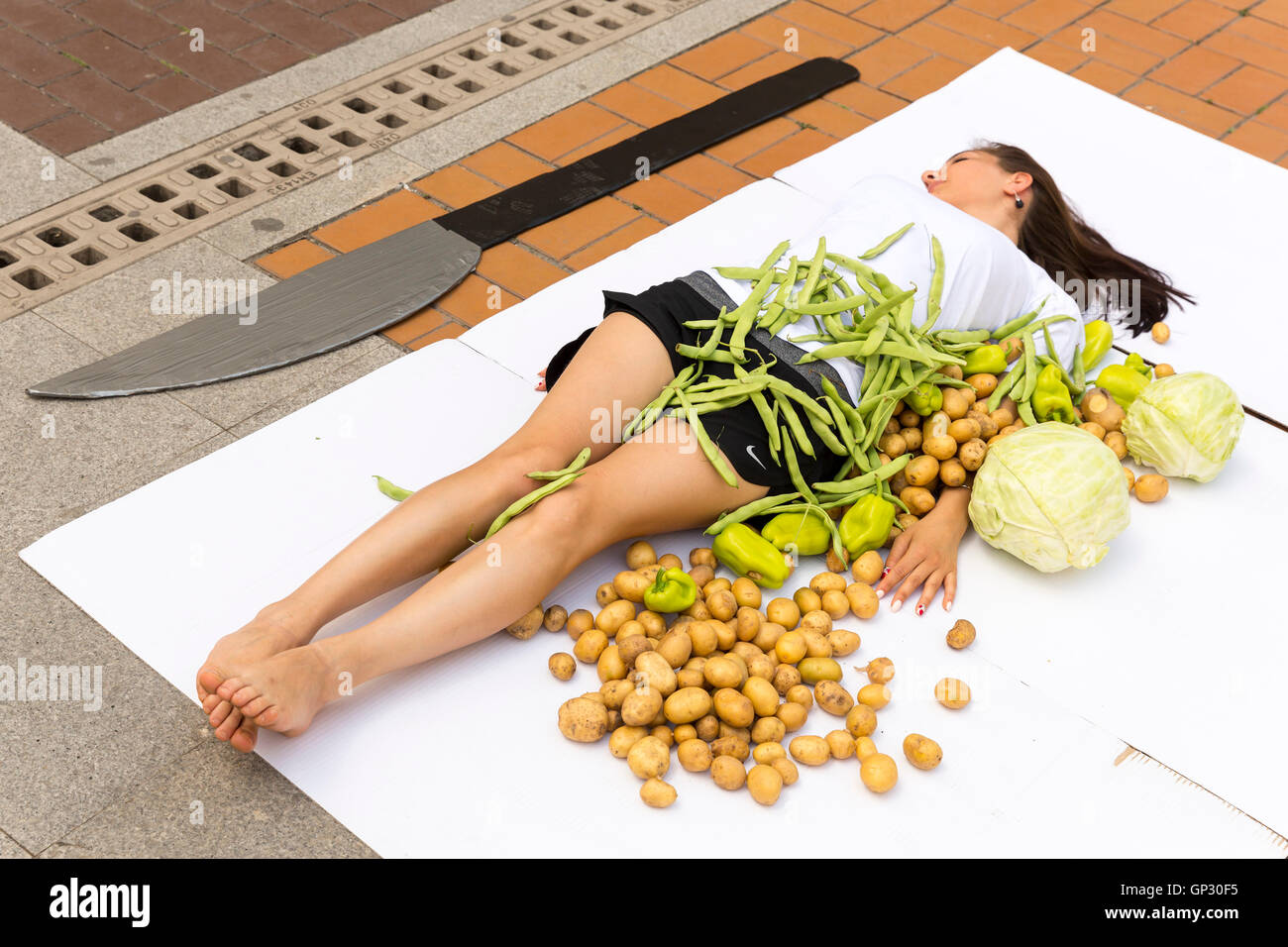 Sofia, Bulgaria - June 21, 2016: Vegans and vegetarians animal rights activists are cooking humans during a protes against killi Stock Photo