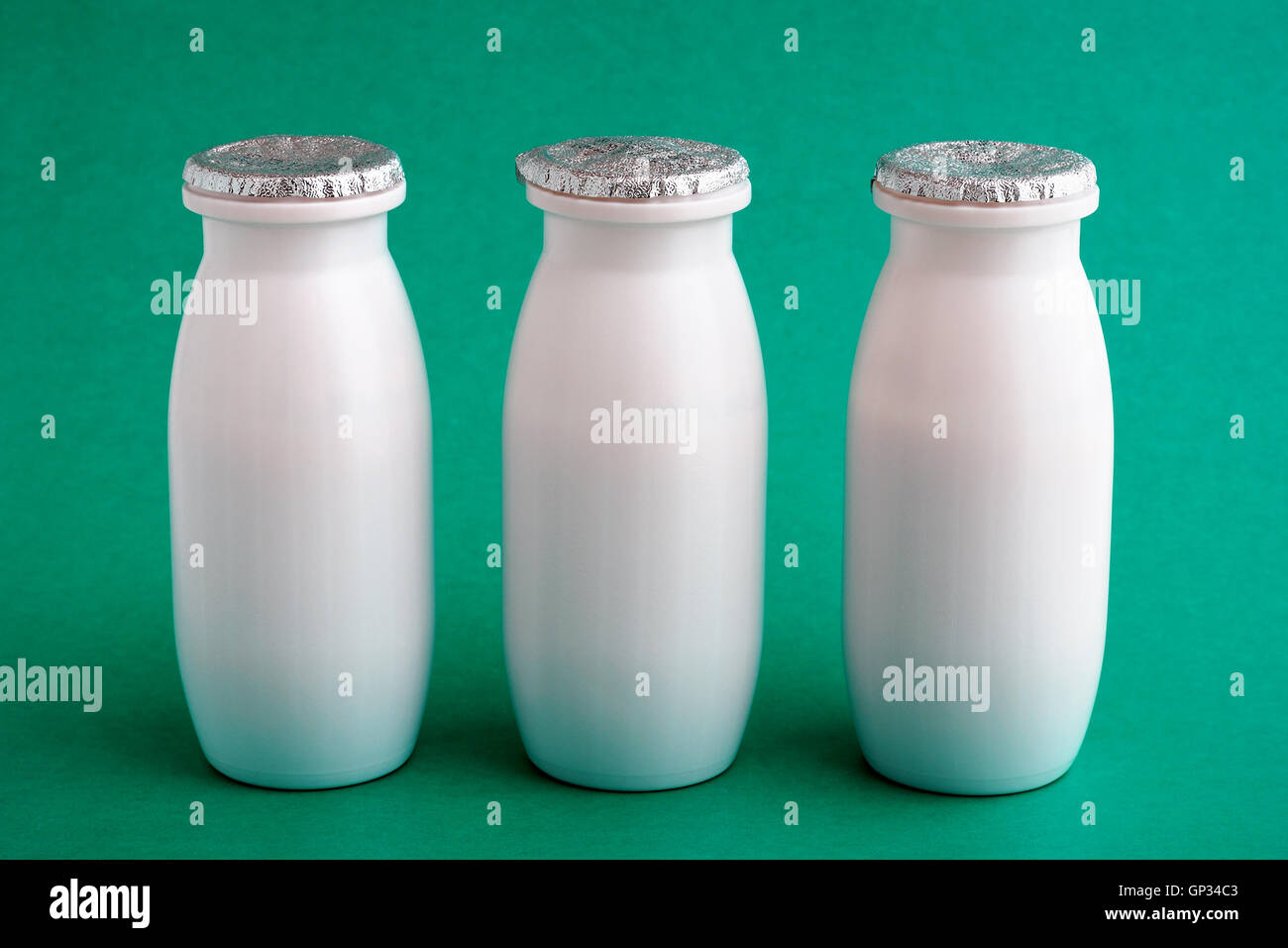 Three bottles of yogurt Stock Photo Alamy