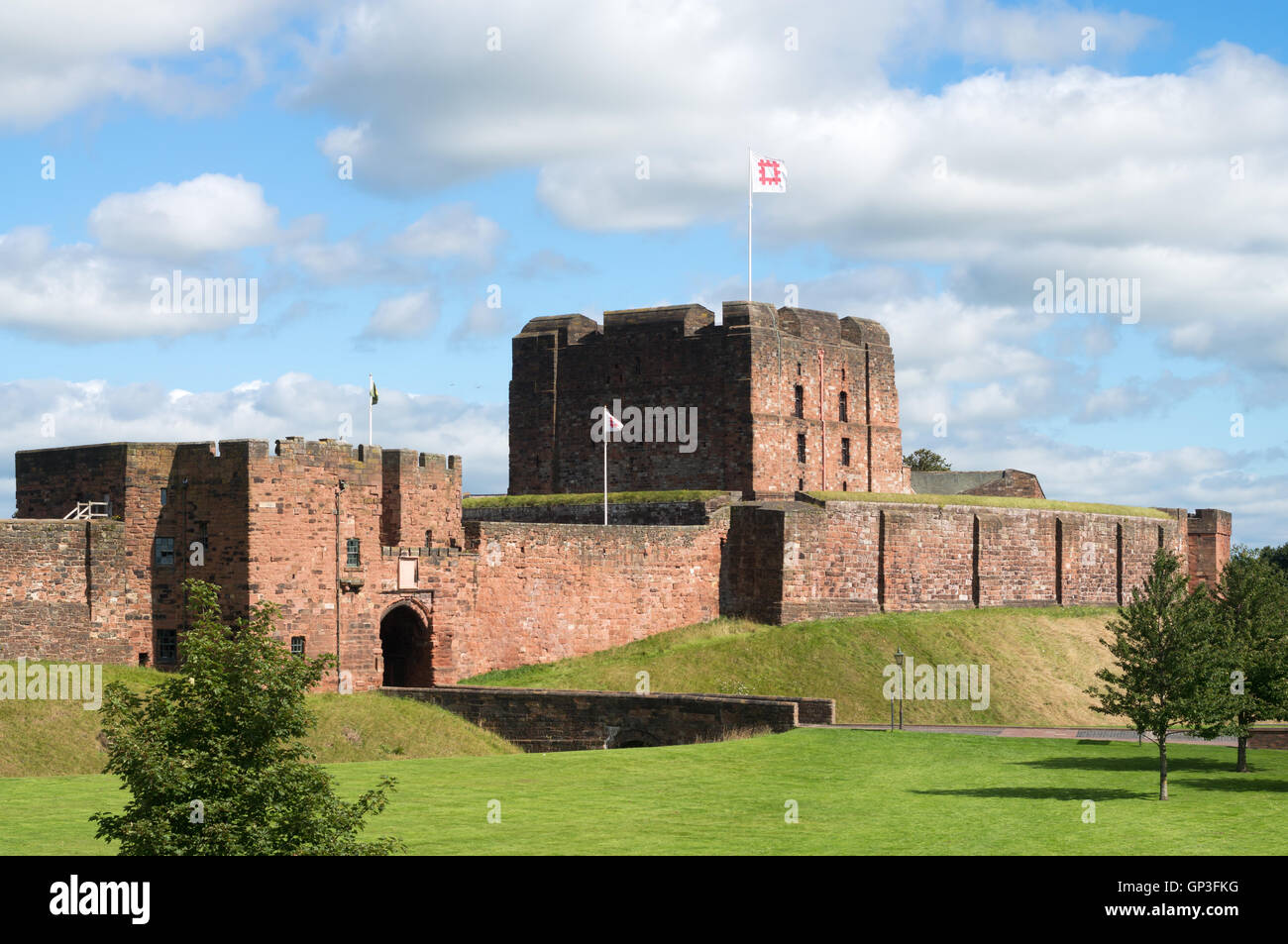 Carlisle castle keep and outer wall, with English Heritage flag flying, Cumbria, England, UK Stock Photo