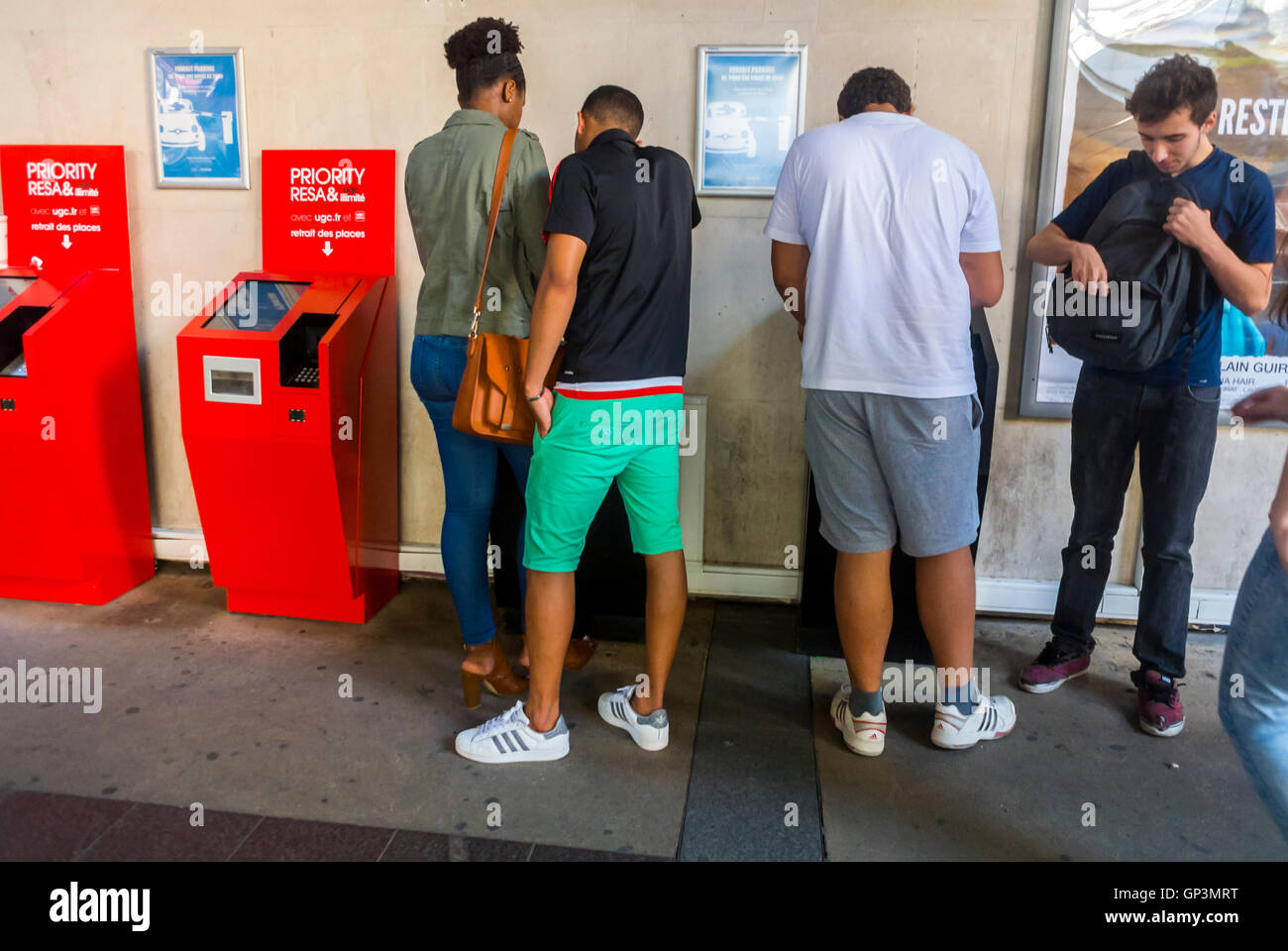 Paris, France, Interior, French Teenagers, Buying Tickets at Vending Machine in Hall, Ciné Cité, Cinema Multiplex THeater, in the Neighbourhood, Bercy, people going to the cinema, movie theater lobby Stock Photo