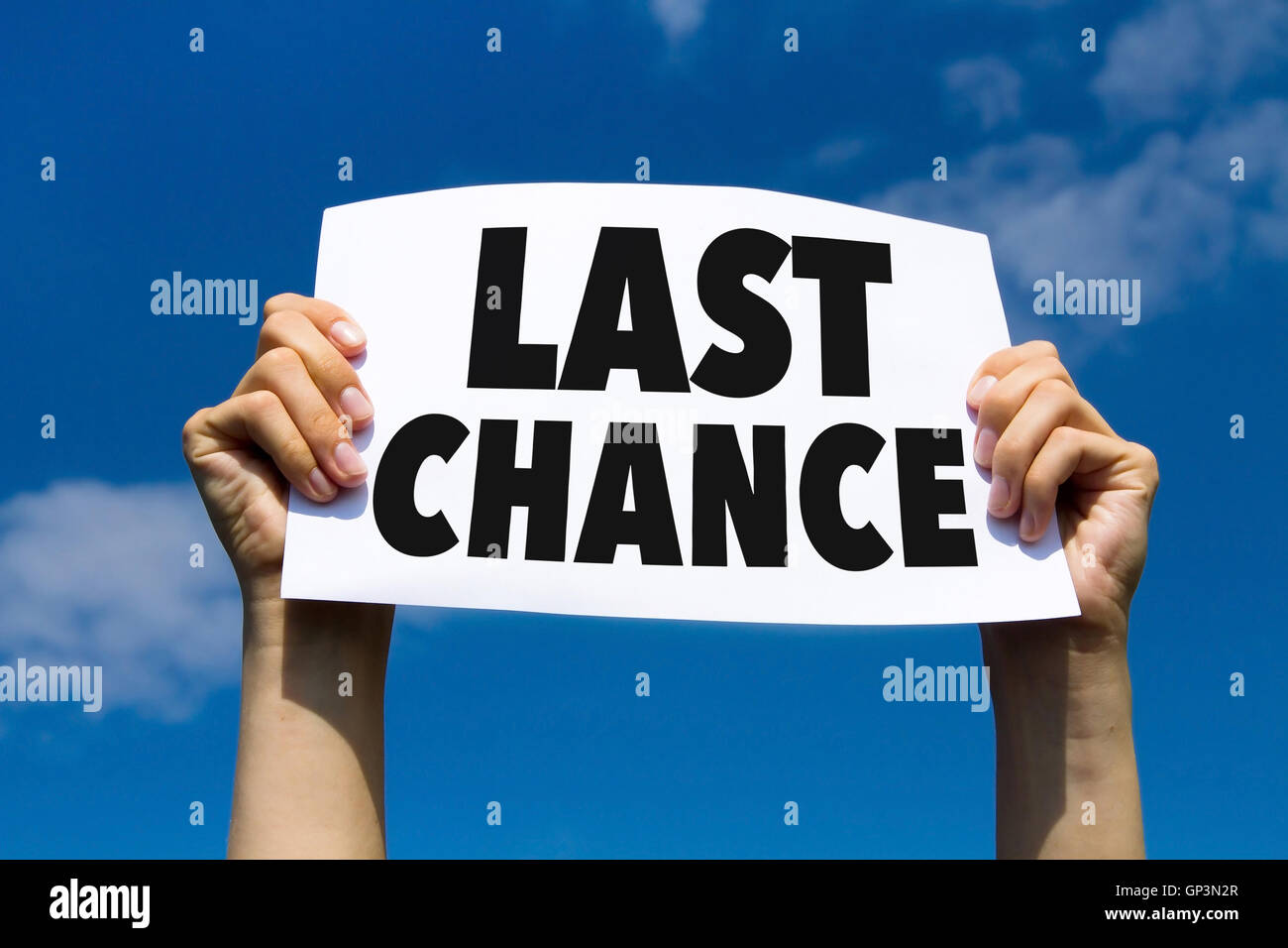 last chance, concept, hands holding paper sign Stock Photo