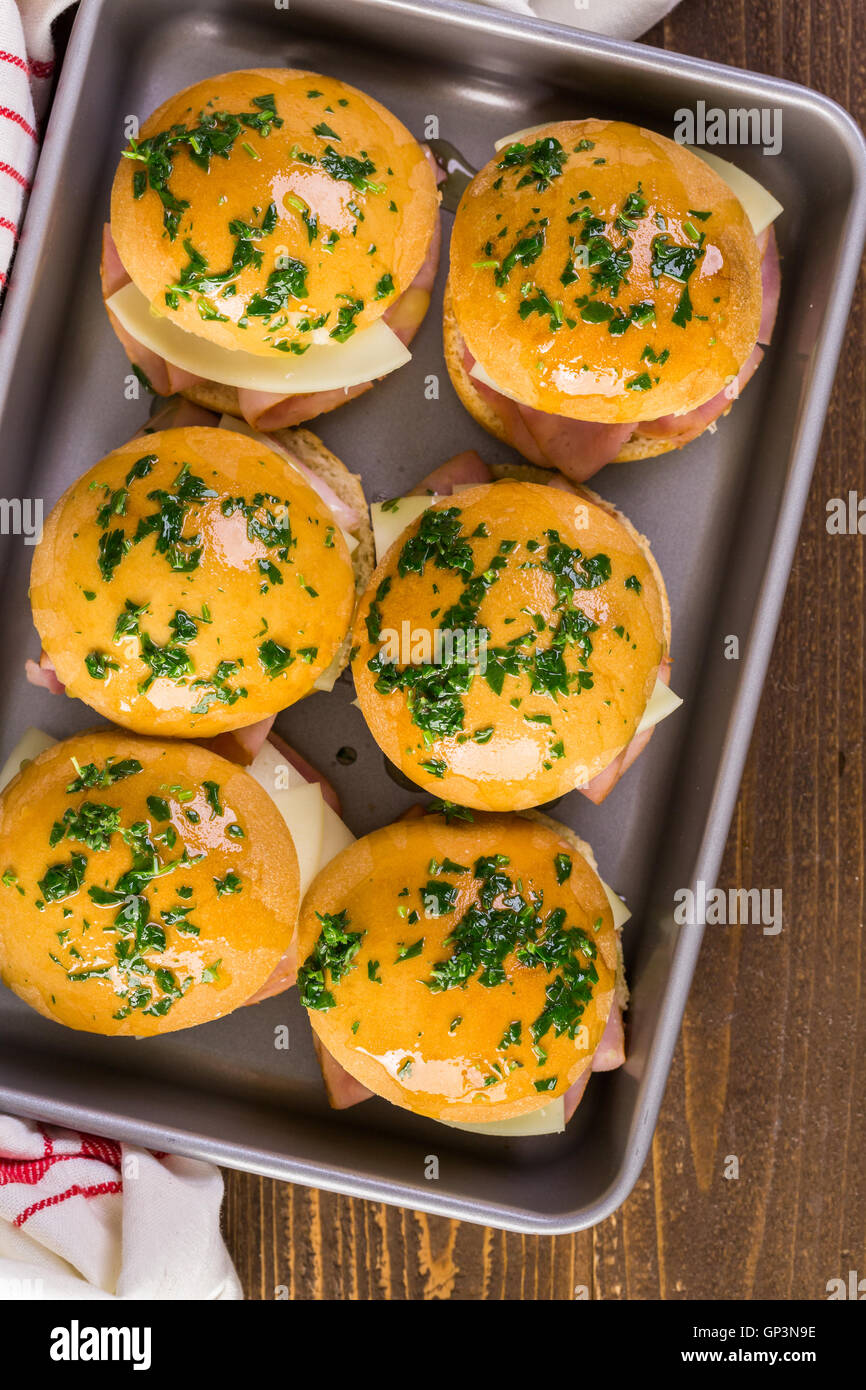 Ham and cheese sliders on homemade dinner rolls Stock Photo Alamy