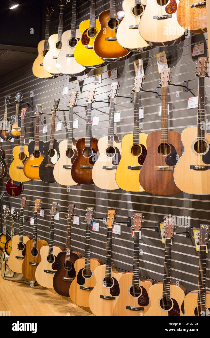 Fort Wayne, Indiana - Acoustic guitars on display at the Sweetwater Music Instruments & Pro Audio store. Stock Photo