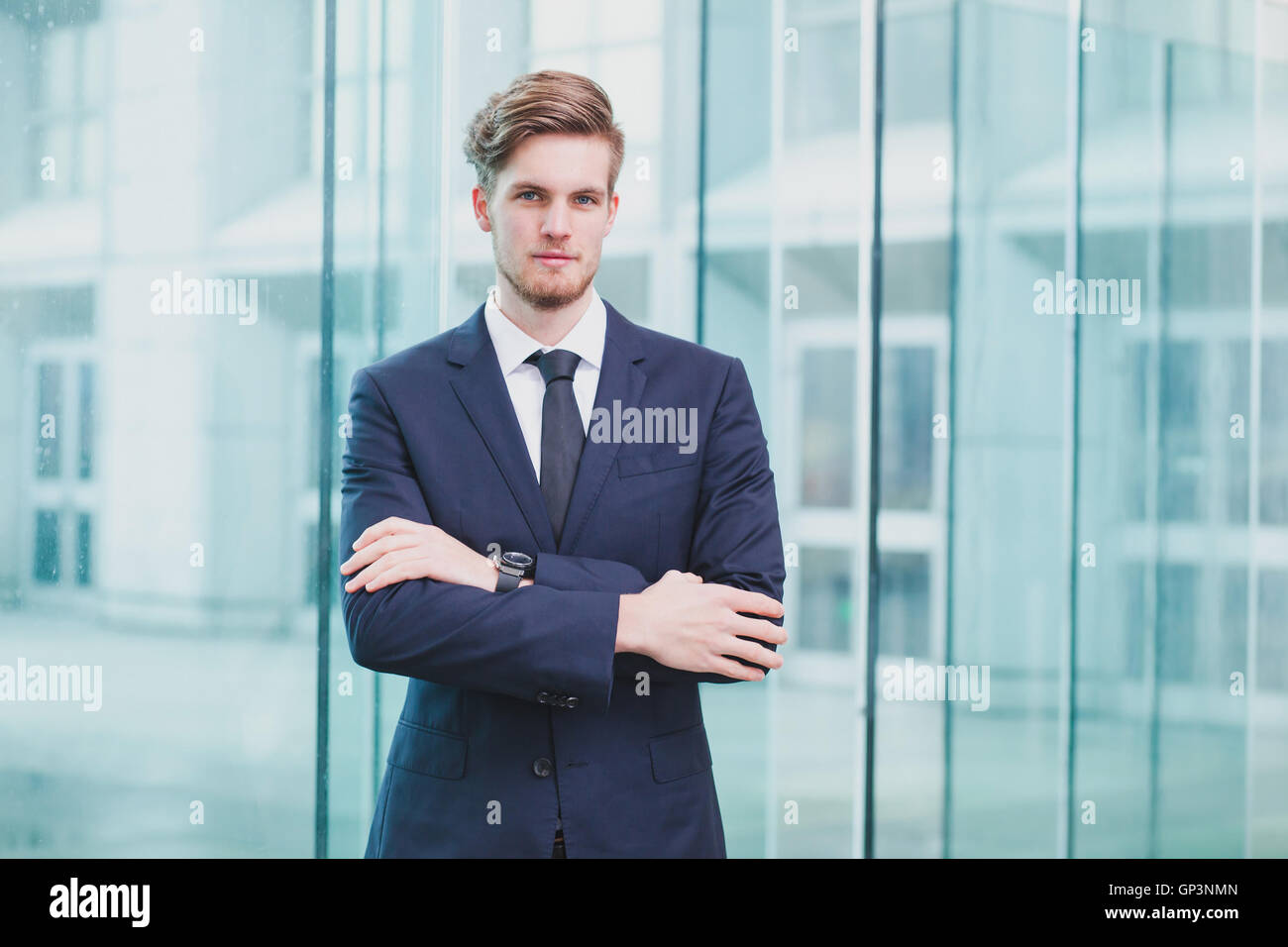 portrait of young successful businessman, career opportunity background Stock Photo