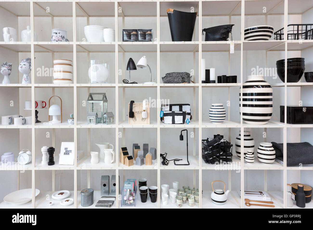 Monochrome shelf display of black and white gifts souvenirs baskets