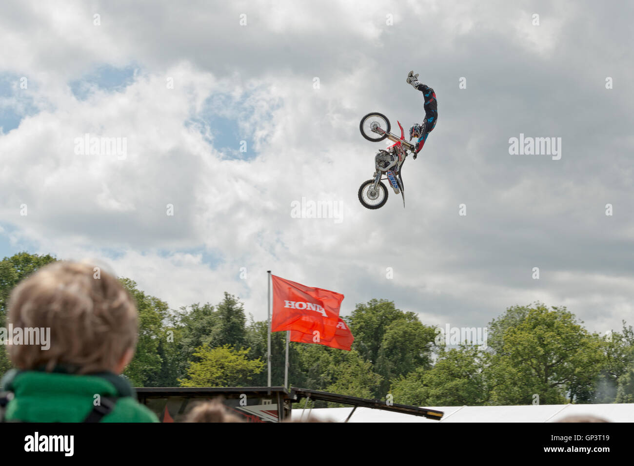 Stunt motorcyclist in mid-air Stock Photo
