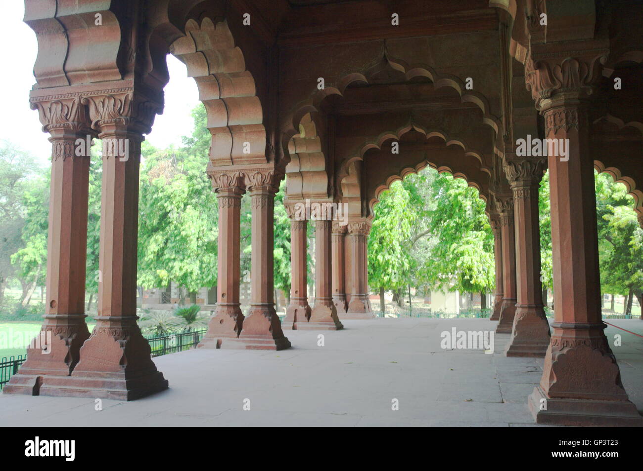 Red color pillars supporting arched structure of Deewan-E-Aam (Hall of Public Audience) in Red Fort, Delhi, India, Asia Stock Photo