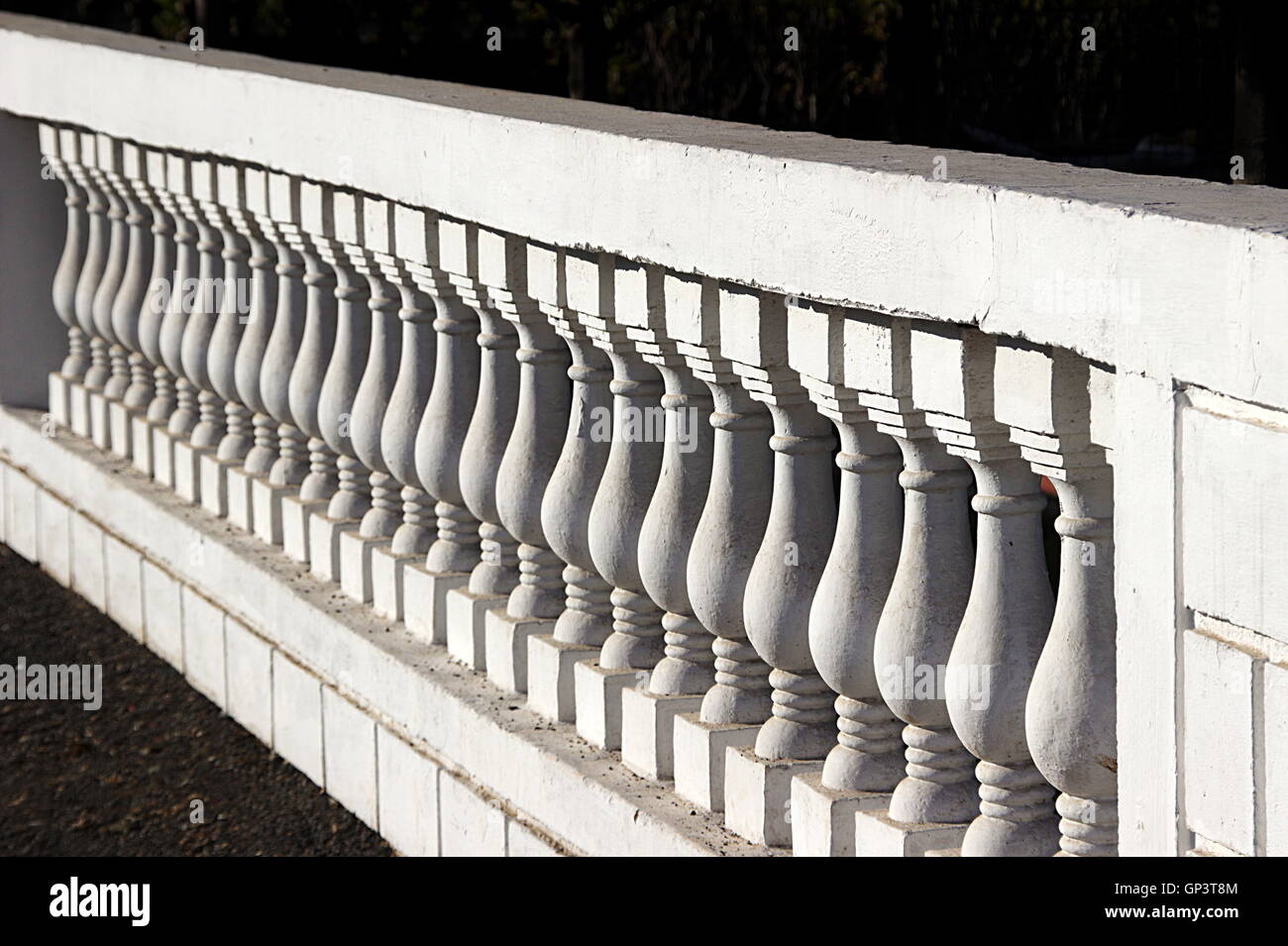Diagonal view of interesting, repetitive pattern of molded concrete compound Stock Photo
