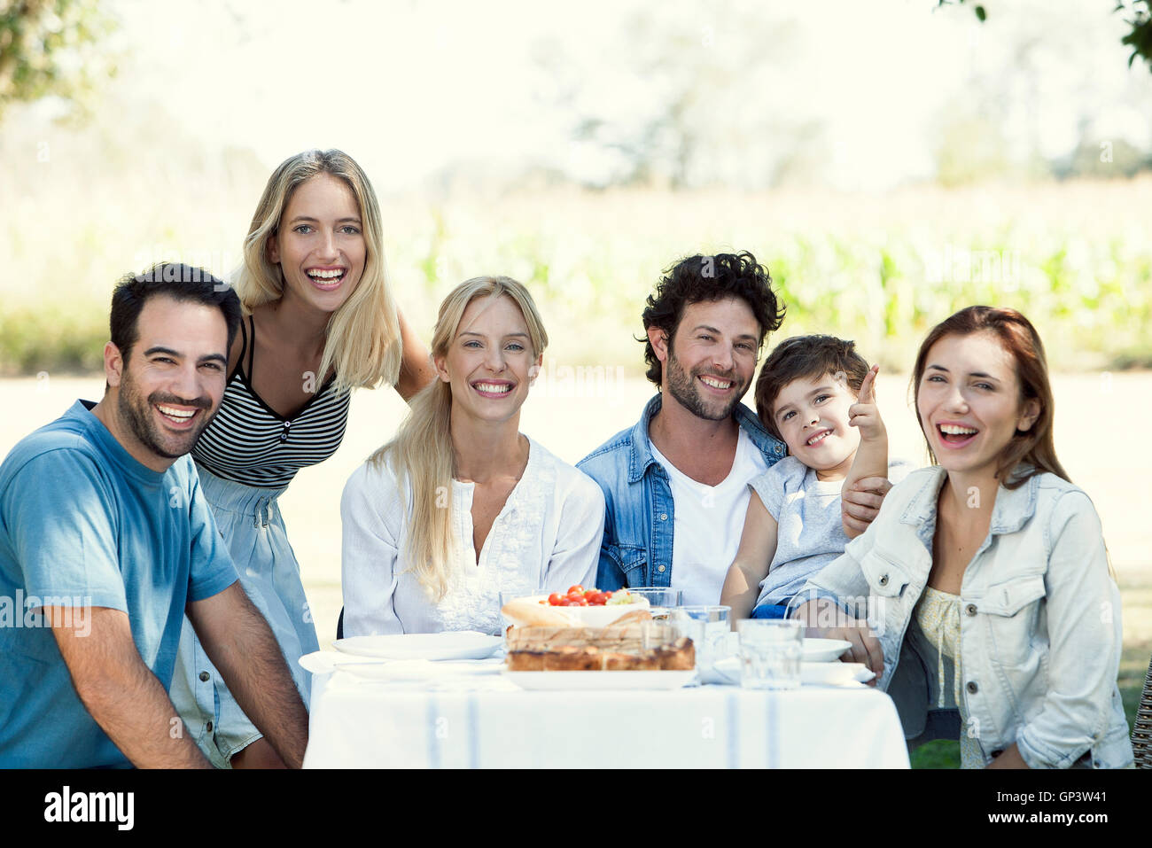 Family spending time together outdoors, group portrait Stock Photo