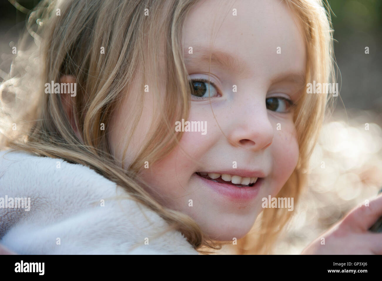 Little girl smiling, portrait Stock Photo
