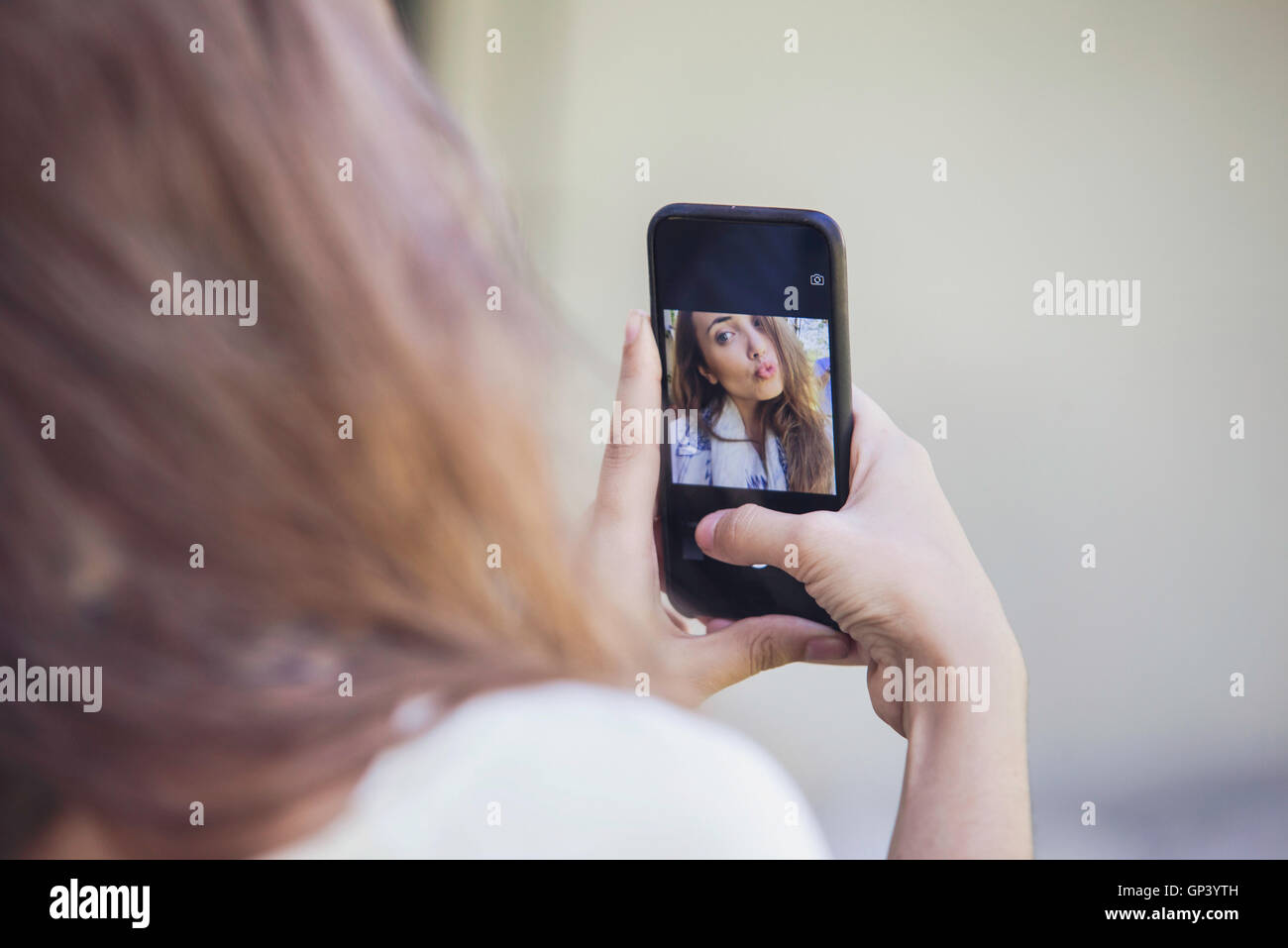 Woman taking selfie Stock Photo
