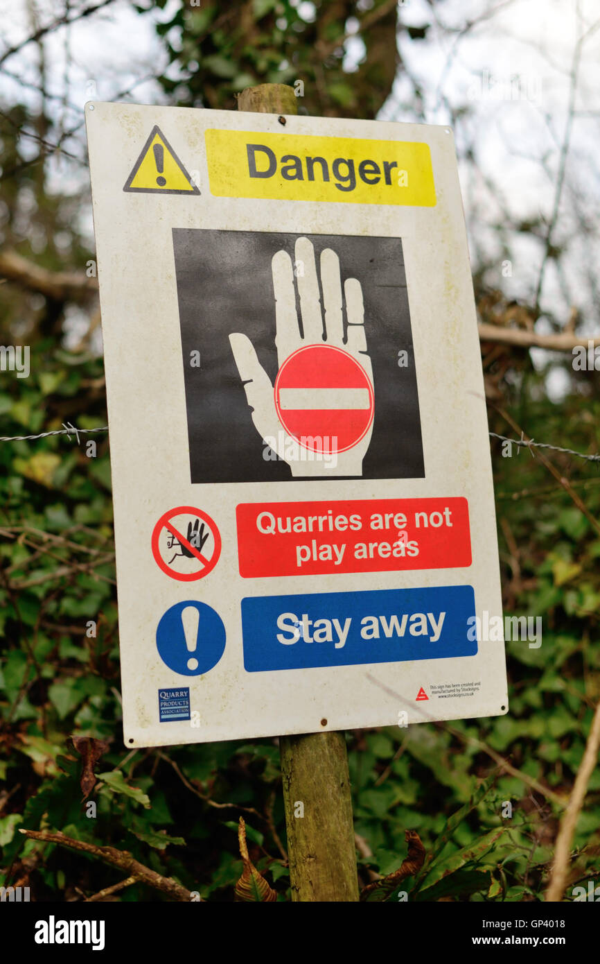 Notice warning children to keep away from a quarry. Stock Photo