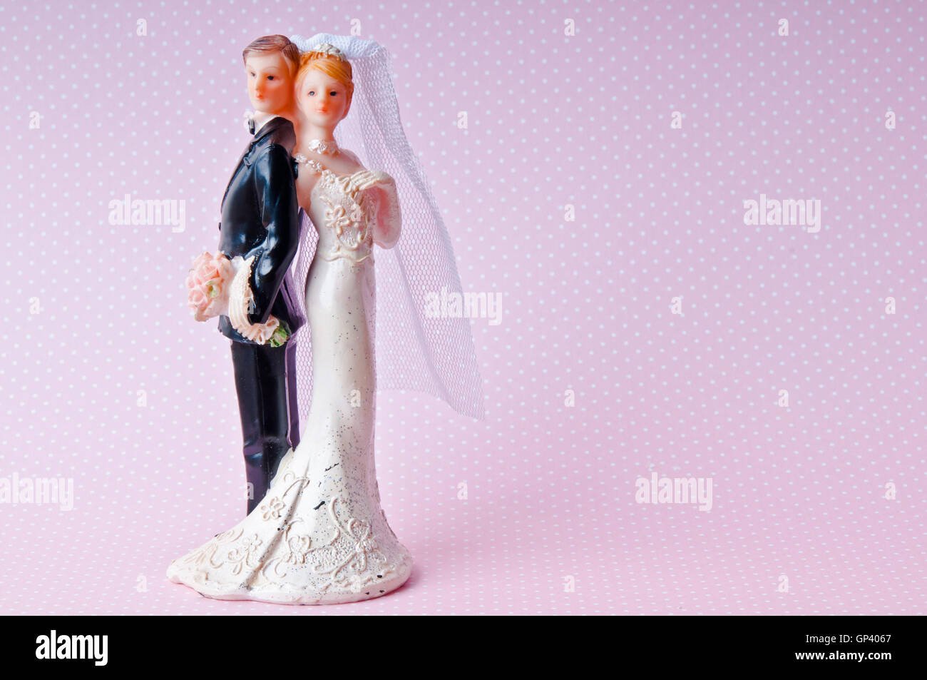 heterosexual bride and groom cake topper Stock Photo