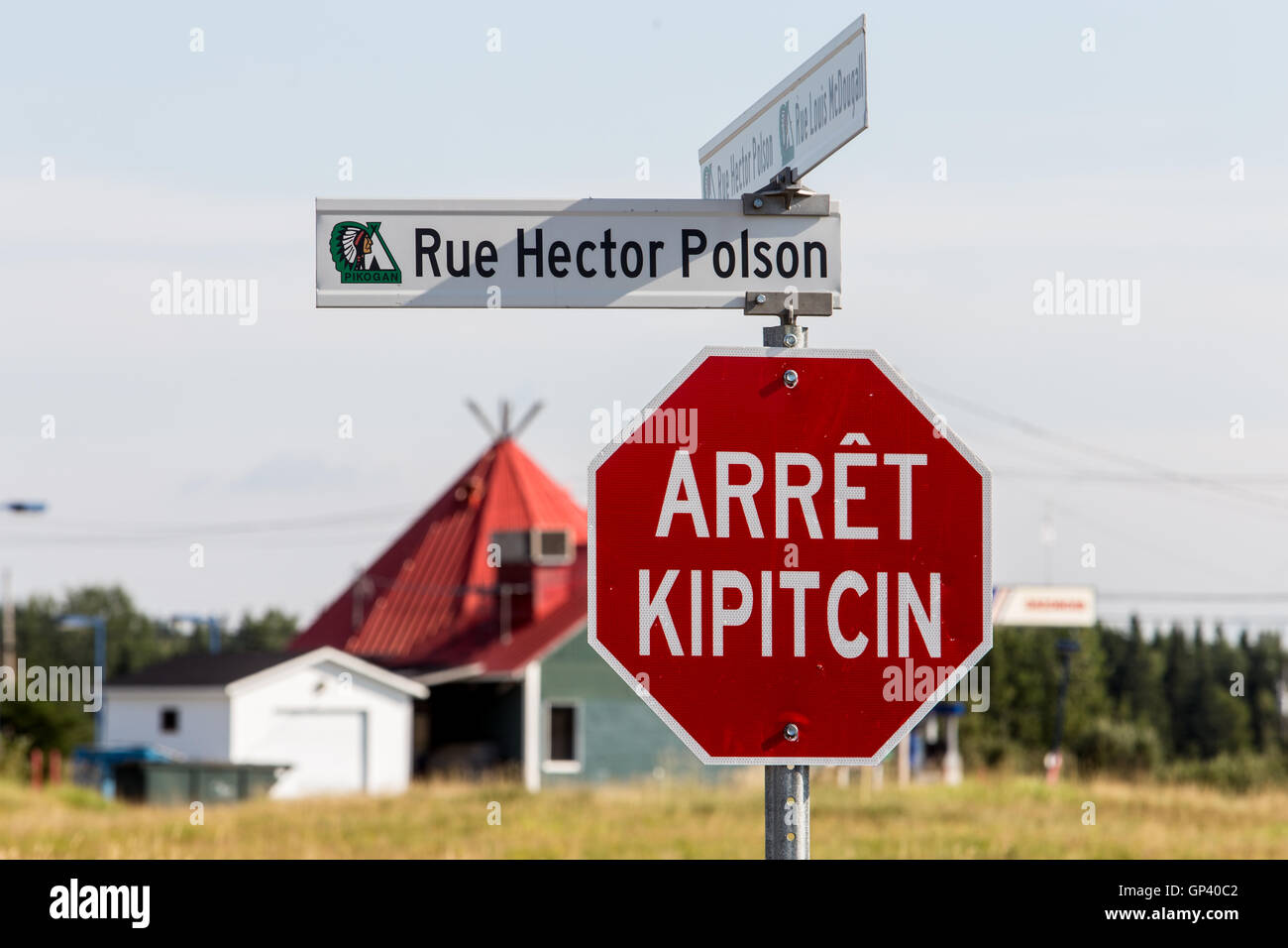 A bilingual Algonquin-French stop sign is pictured in the Indian reserve of Pikogan, home of the Abitibiwinni First Nation, near Stock Photo