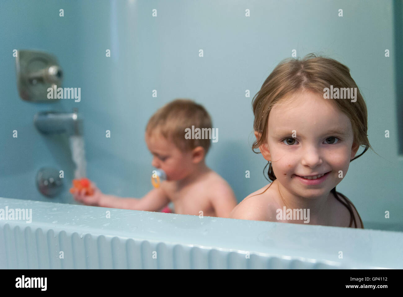 Young siblings taking a bath Stock Photo Alamy Young siblings taking a bath Stock Photo Alamy
