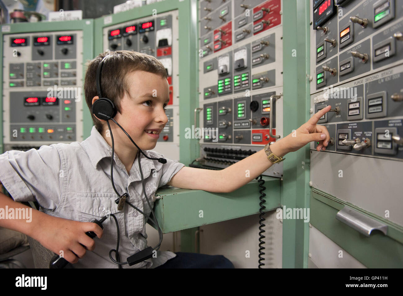 Boy enjoying interactive exhibit at space museum Stock Photo Alamy