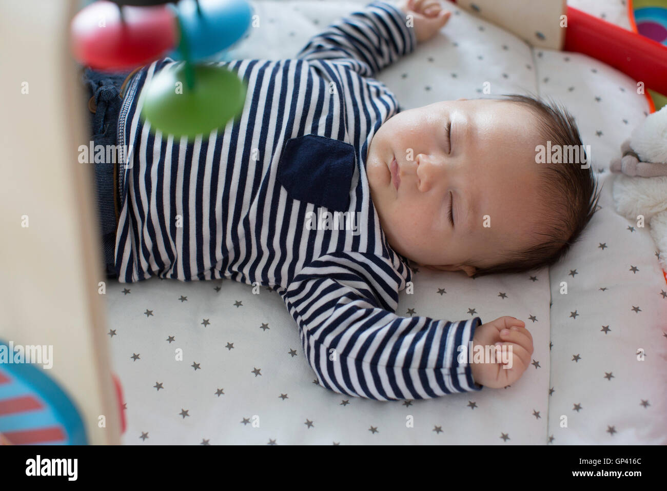 Baby sleeping in crib hi-res stock photography and images - Alamy