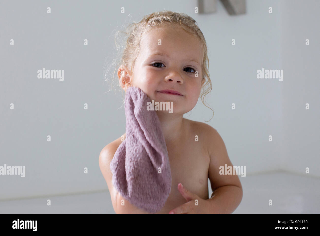 Little girl taking bath Stock Photo