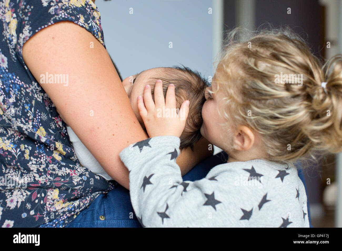 Mother with baby and little girl Stock Photo