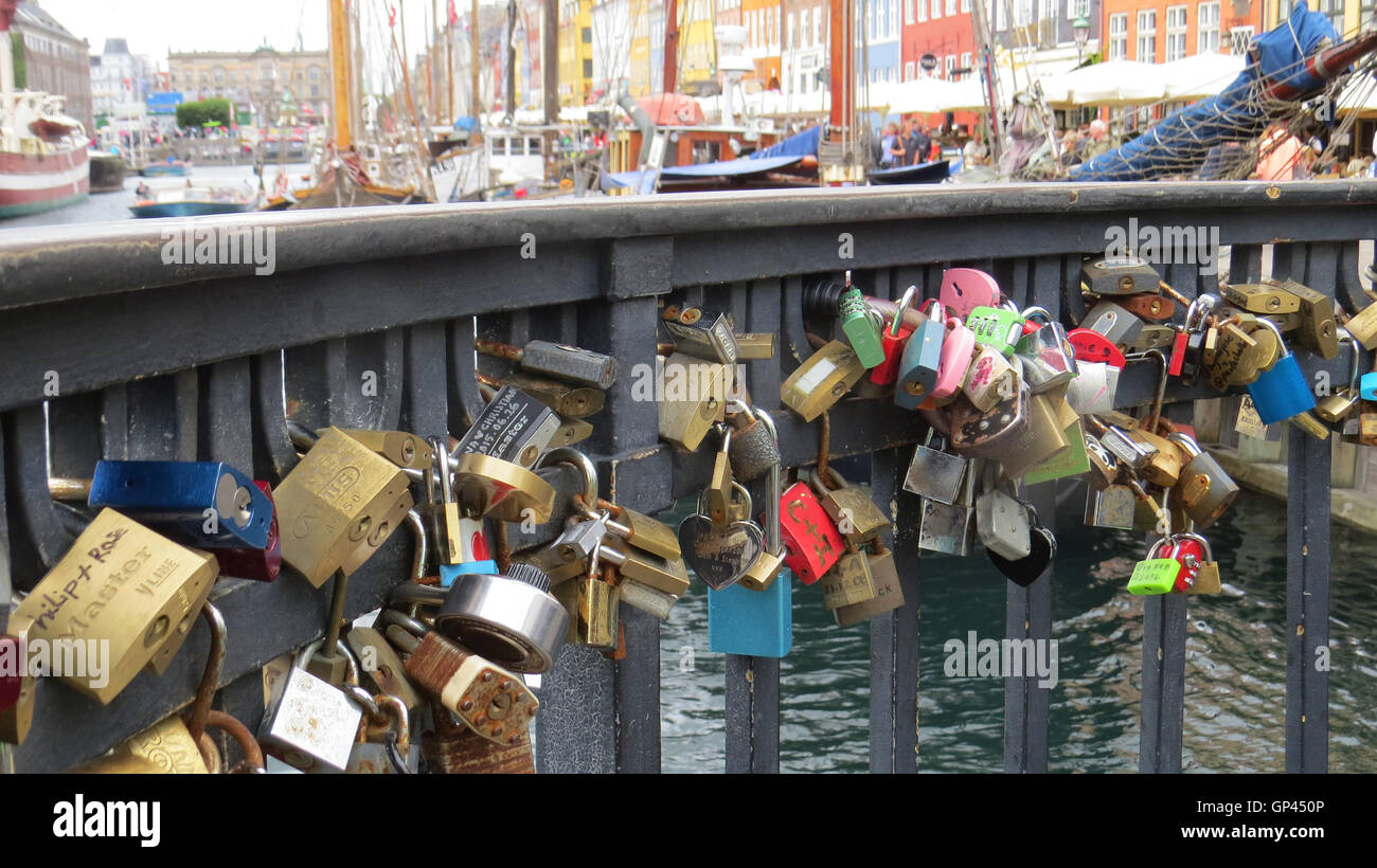 LOVE LOCKS on canal bridge at Nyhaven, Copenhagen, Denmark. Photo Tony Gale Stock Photo