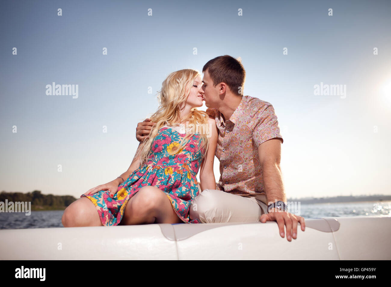 kissing couple on the boat Stock Photo - Alamy