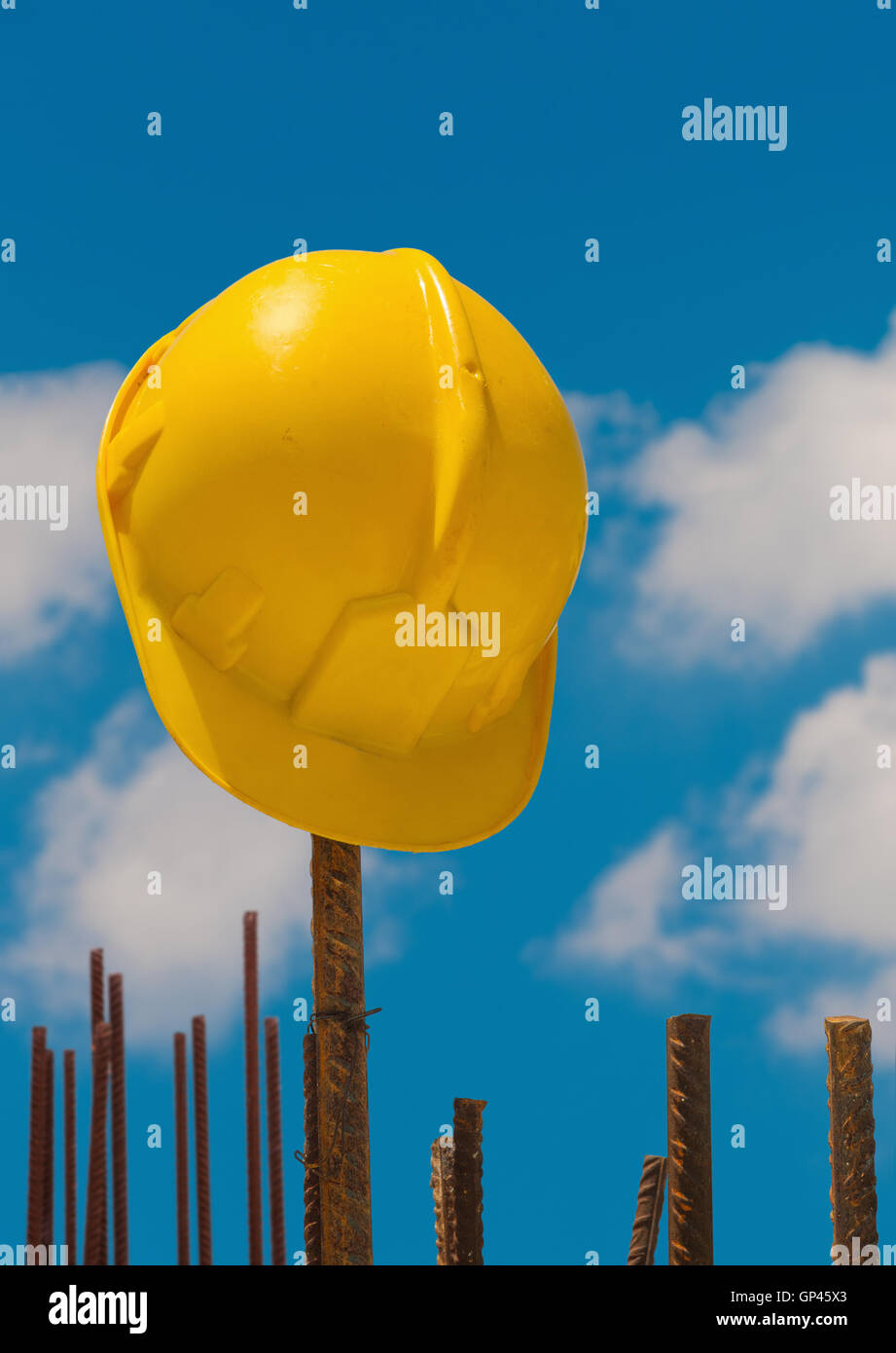 Construction helmet on steel bars Stock Photo Alamy