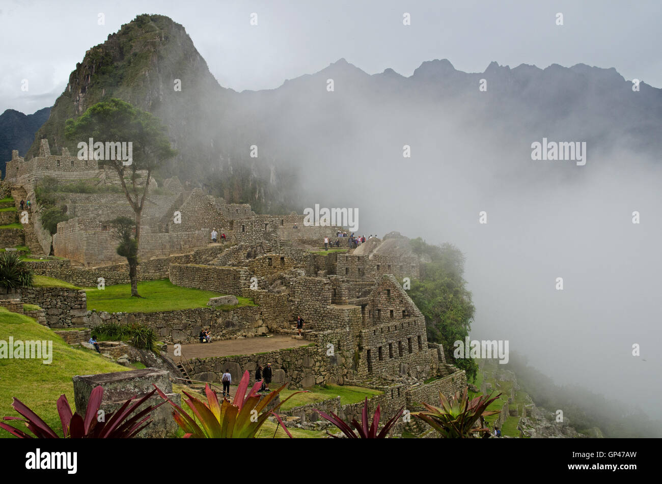 Clouds invading Machu Picchu Stock Photo - Alamy