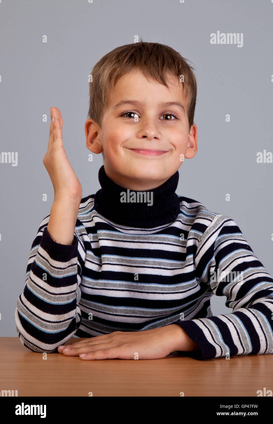 Cheerful Schoolboy ready to answer question Stock Photo Alamy