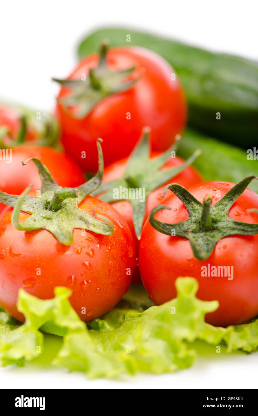 Cucumbers and tomatoes ready for salad Stock Photo - Alamy