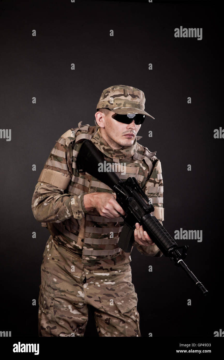 Modern Rifles Uniform Modern soldier with rifle Stock Photo - Alamy