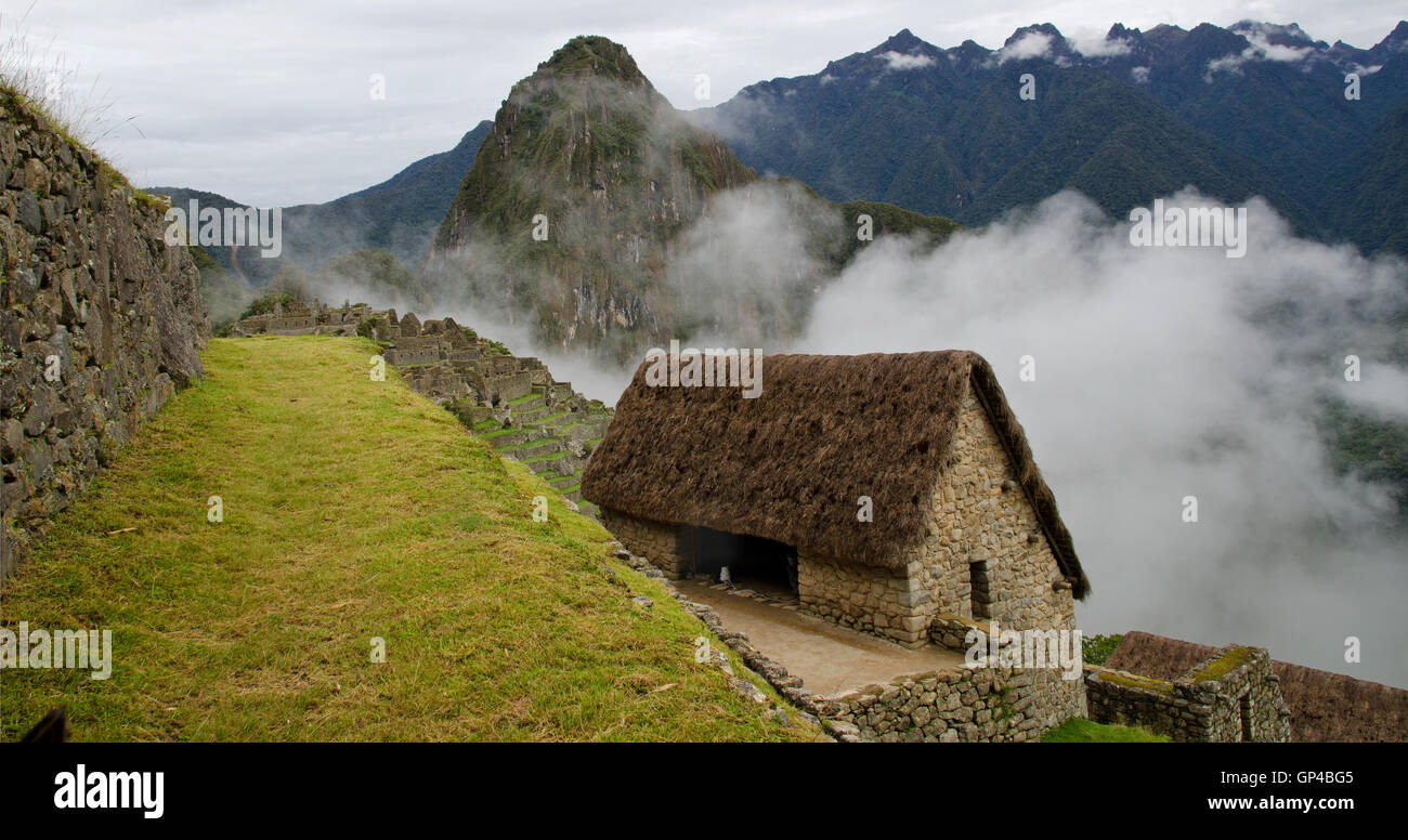 Clouds at the entrance of Machu Picchu Stock Photo