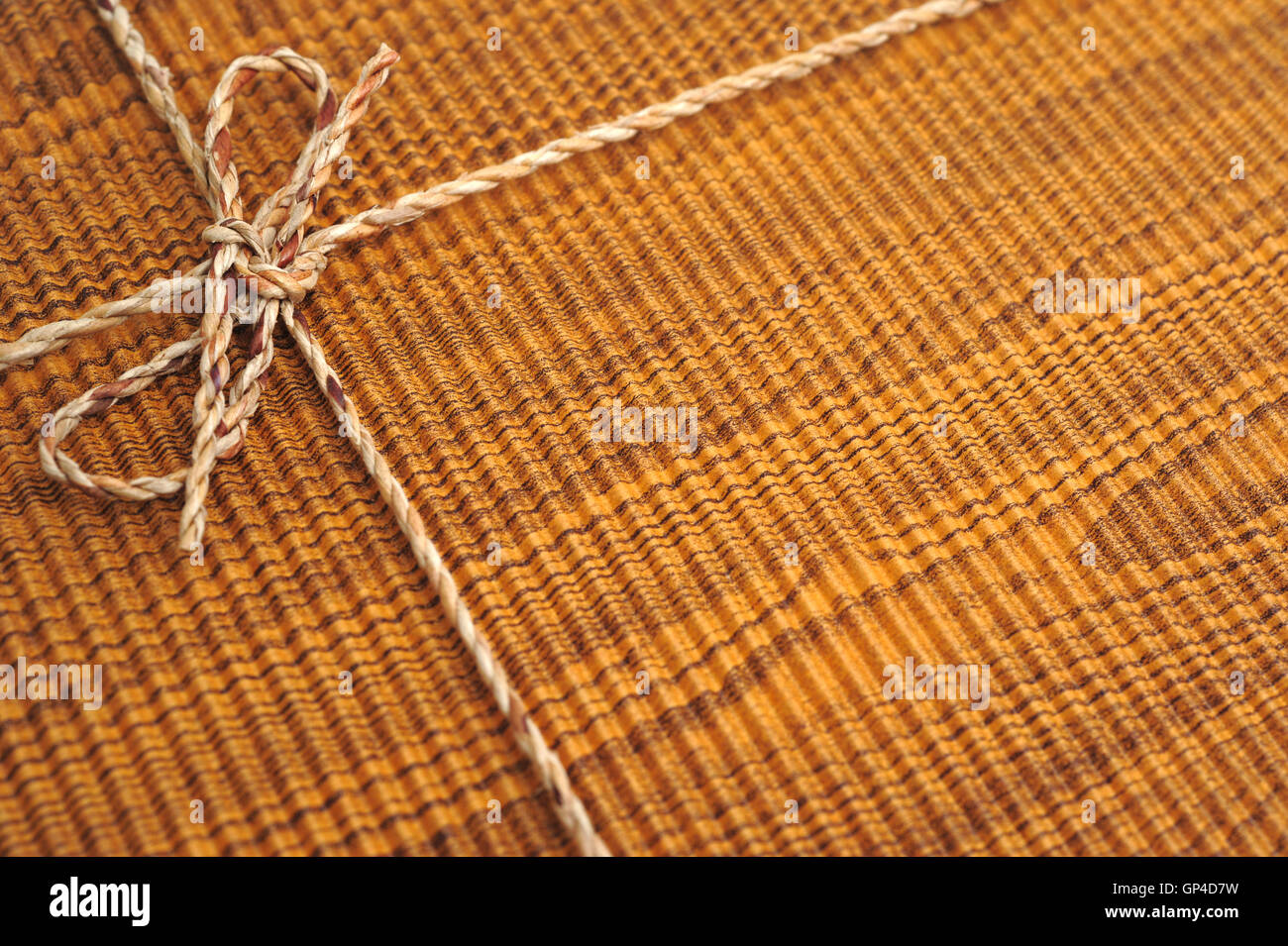 Brown cardboard box with string Stock Photo - Alamy