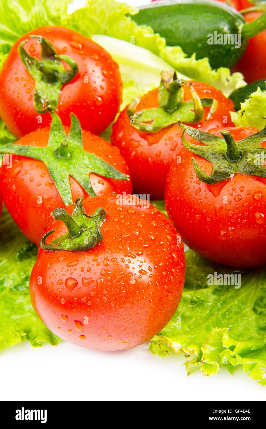 Cucumbers and tomatoes ready for salad Stock Photo - Alamy