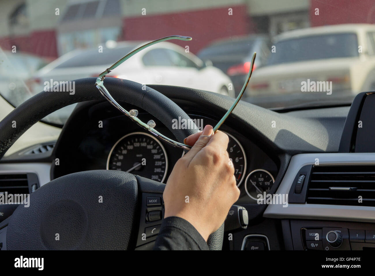 Girl behind steering wheel hi-res stock photography and images - Alamy