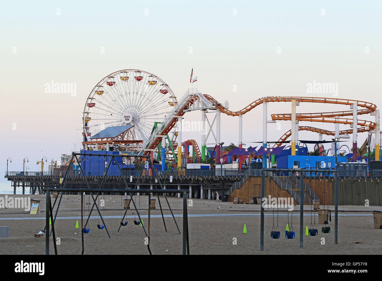 Beach pier amusement park twilight sunrise Stock Photo Alamy