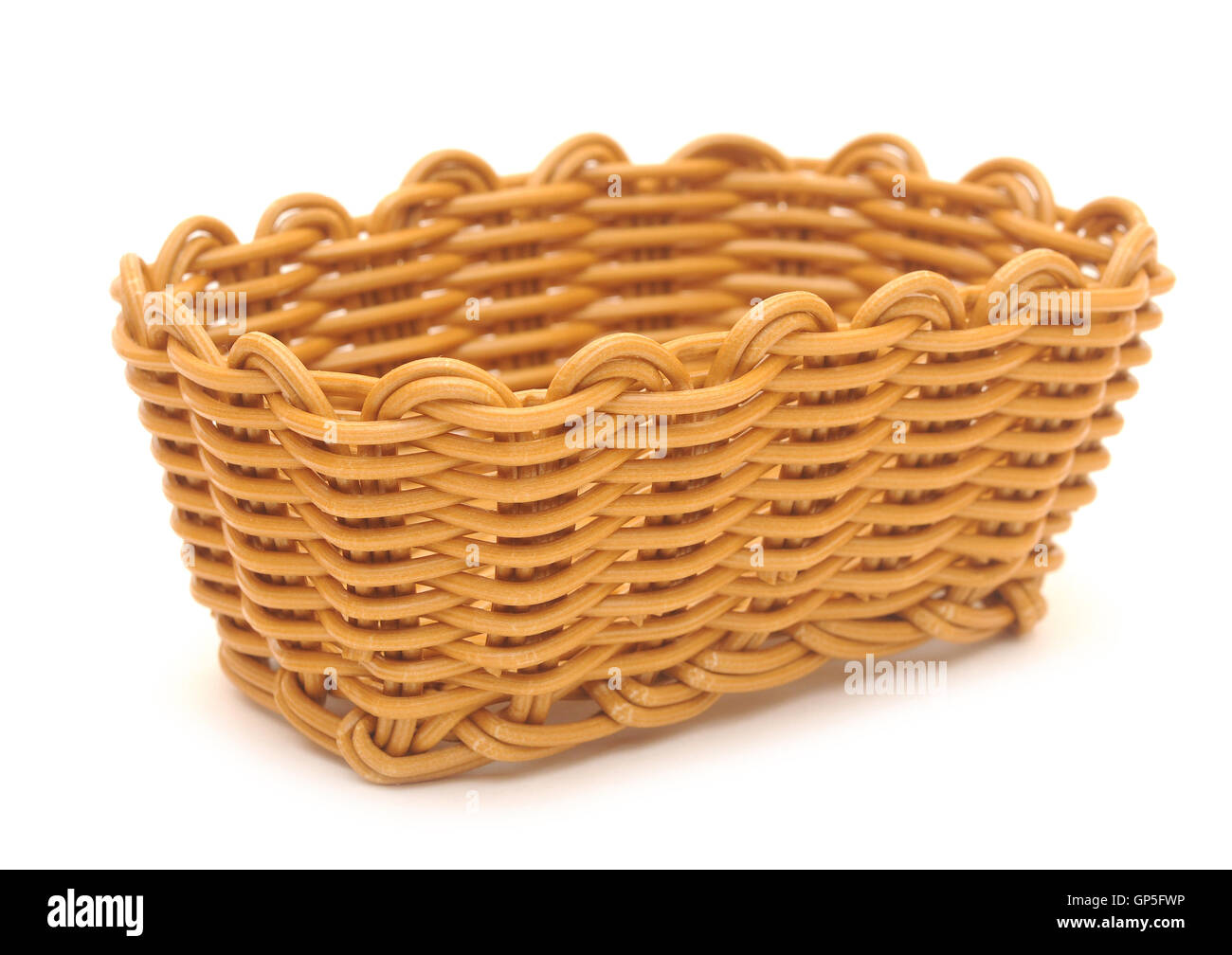 Empty wicker basket. Isolated over white Stock Photo