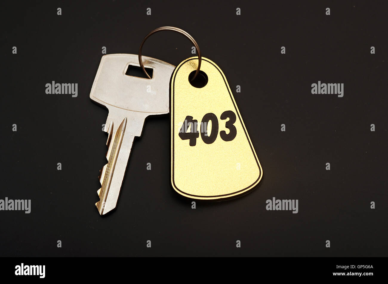 room key on black background Stock Photo