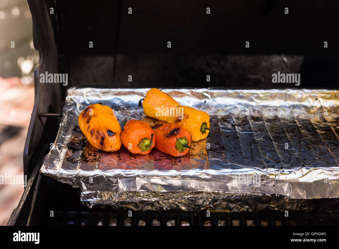 Roasted peppers on the grill Stock Photo Alamy