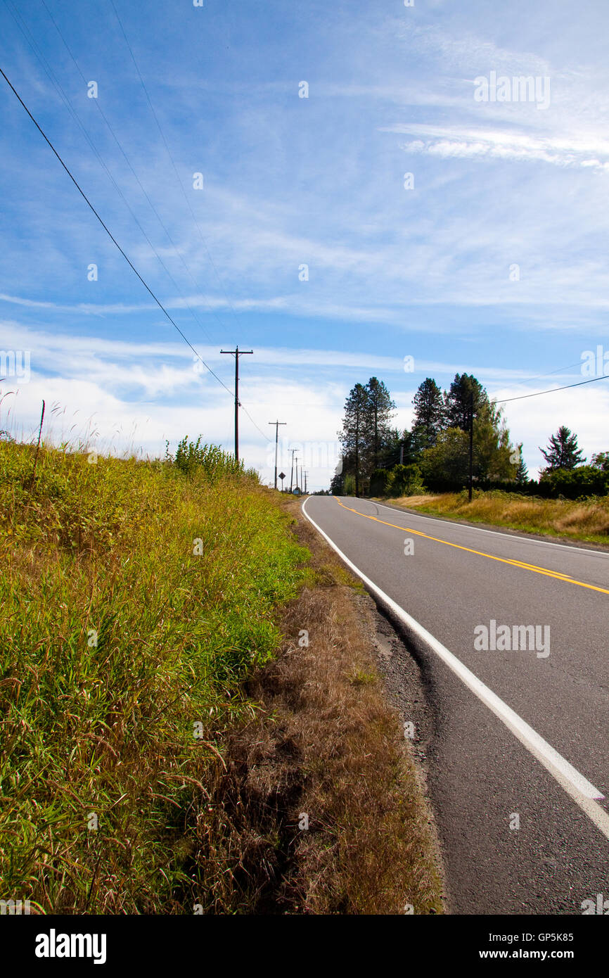 Vertical Rural Road Stock Photo - Alamy