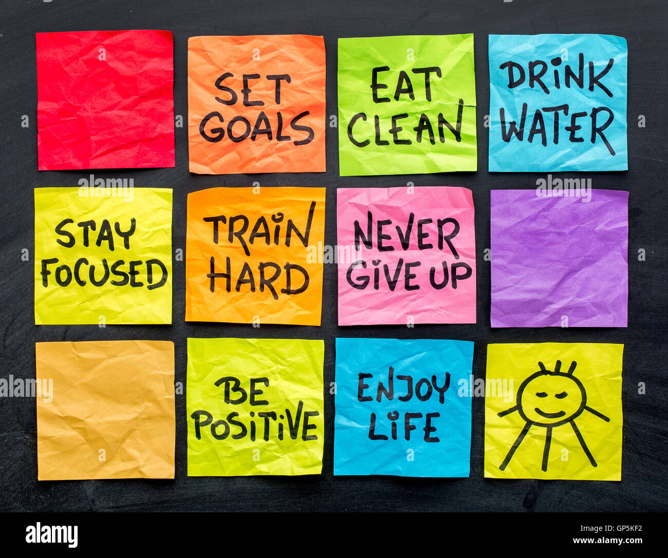healthy lifestyle tips (eating, fitness, mindset, determination, positivity) - handwriting on a set of colorful sticky notes Stock Photo