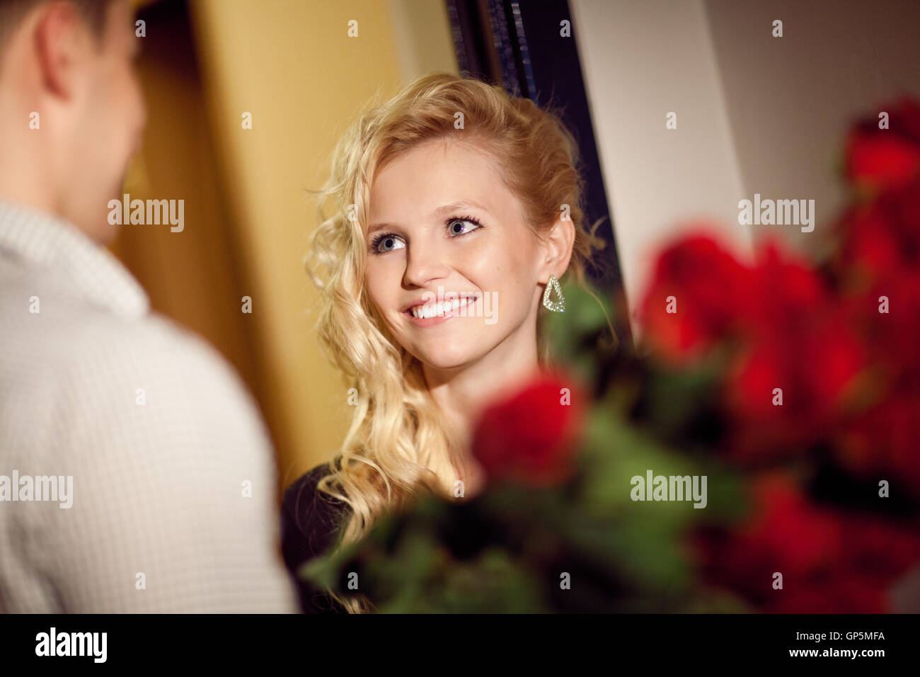 man gives roses to a girl Stock Photo Alamy