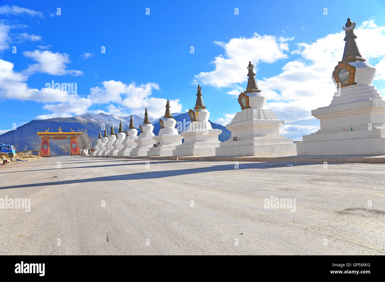 China. Yunnan. Shangri-La region. Dequin, called Shangri-La. Way to Dequin, on the Tibetan Border.Buddhist Stupa. On the Backgro Stock Photo