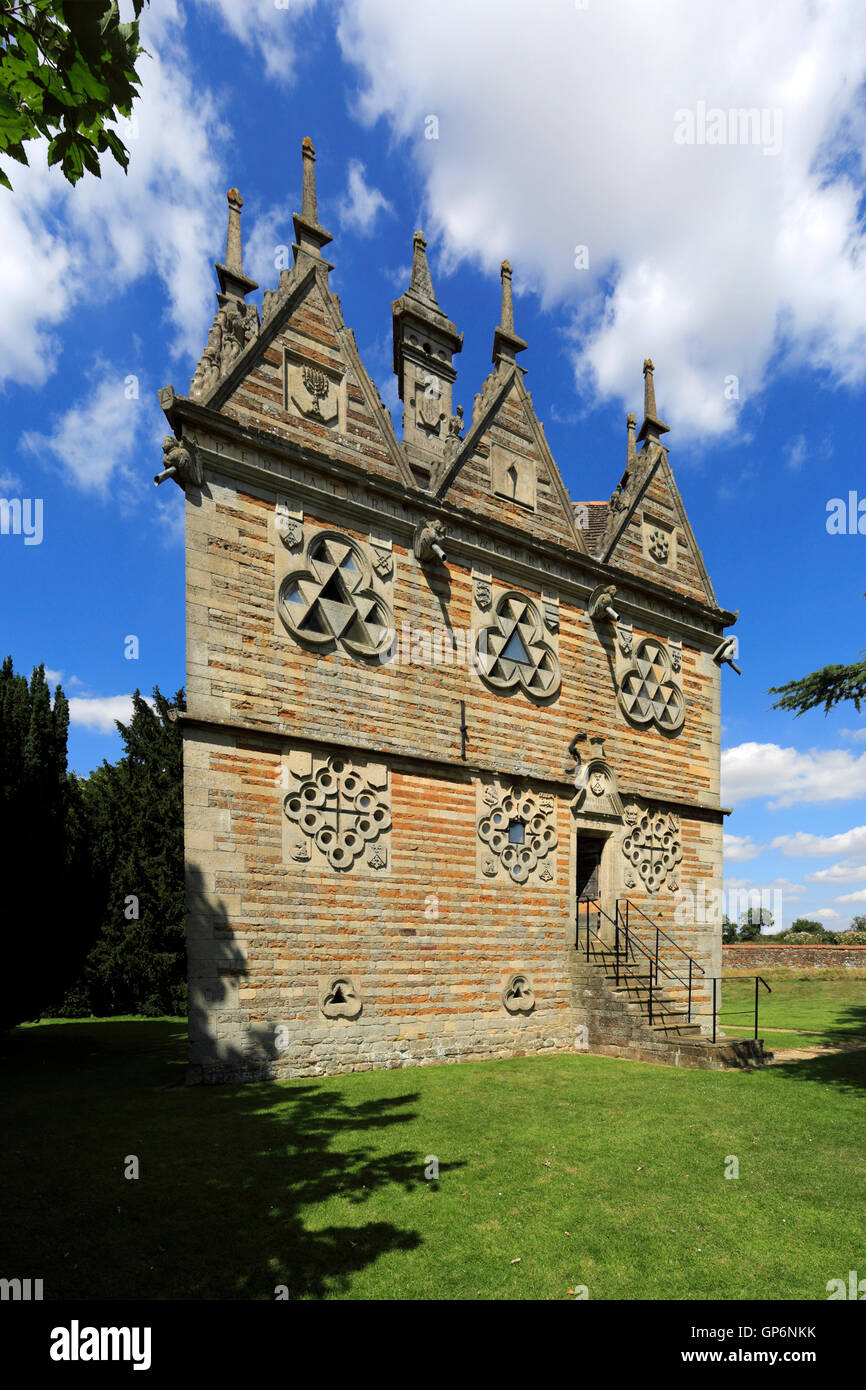 The Rushton Triangular Lodge Folly, built in 1592 by Sir Thomas Tresham, Rushton village, Northamptonshire, England. Stock Photo