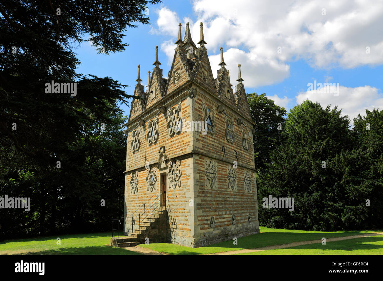 The Rushton Triangular Lodge Folly, built in 1592 by Sir Thomas Tresham, Rushton village, Northamptonshire, England. Stock Photo