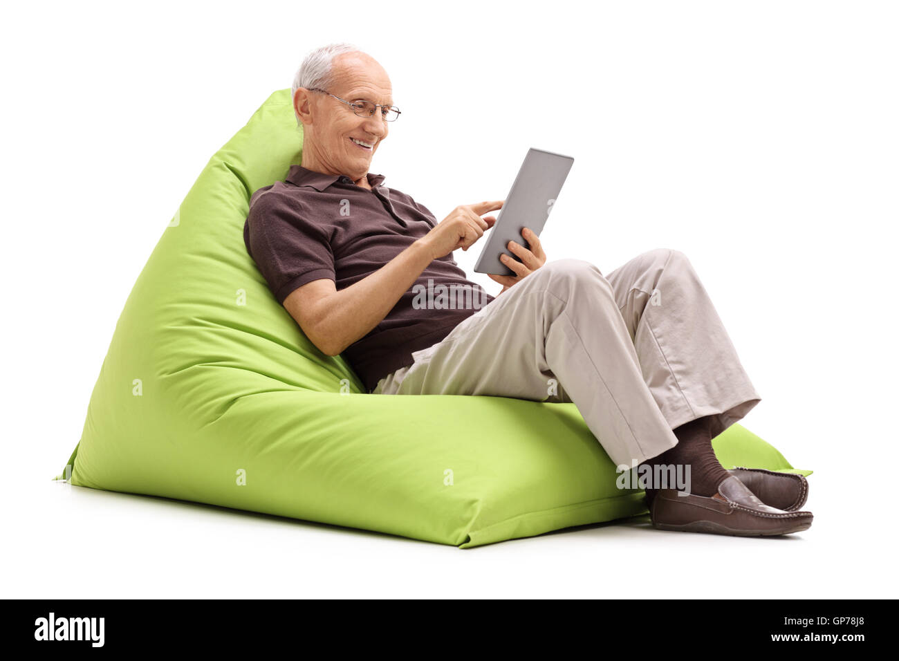 Elderly man sitting on beanbag hi-res stock photography and images - Alamy